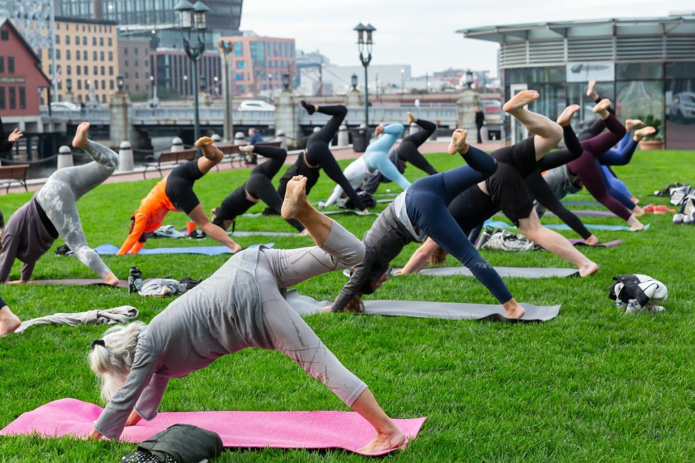 An outdoor yoga class in Boston, MA