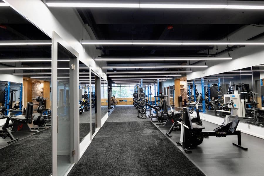 Interior of Studio 617’s new 4,000-square-foot personal training studio featuring squat racks, turf, and recovery tools